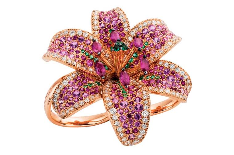 Damiani ring from the new Giglio high jewellery collection, inspired by the white lily, in pink gold with white diamonds, emeralds, sapphires and rubies shading from fuchsia to pale pink.